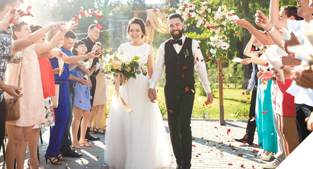 newly wed couple celebrate at their wedding | Sydney Coach Charters